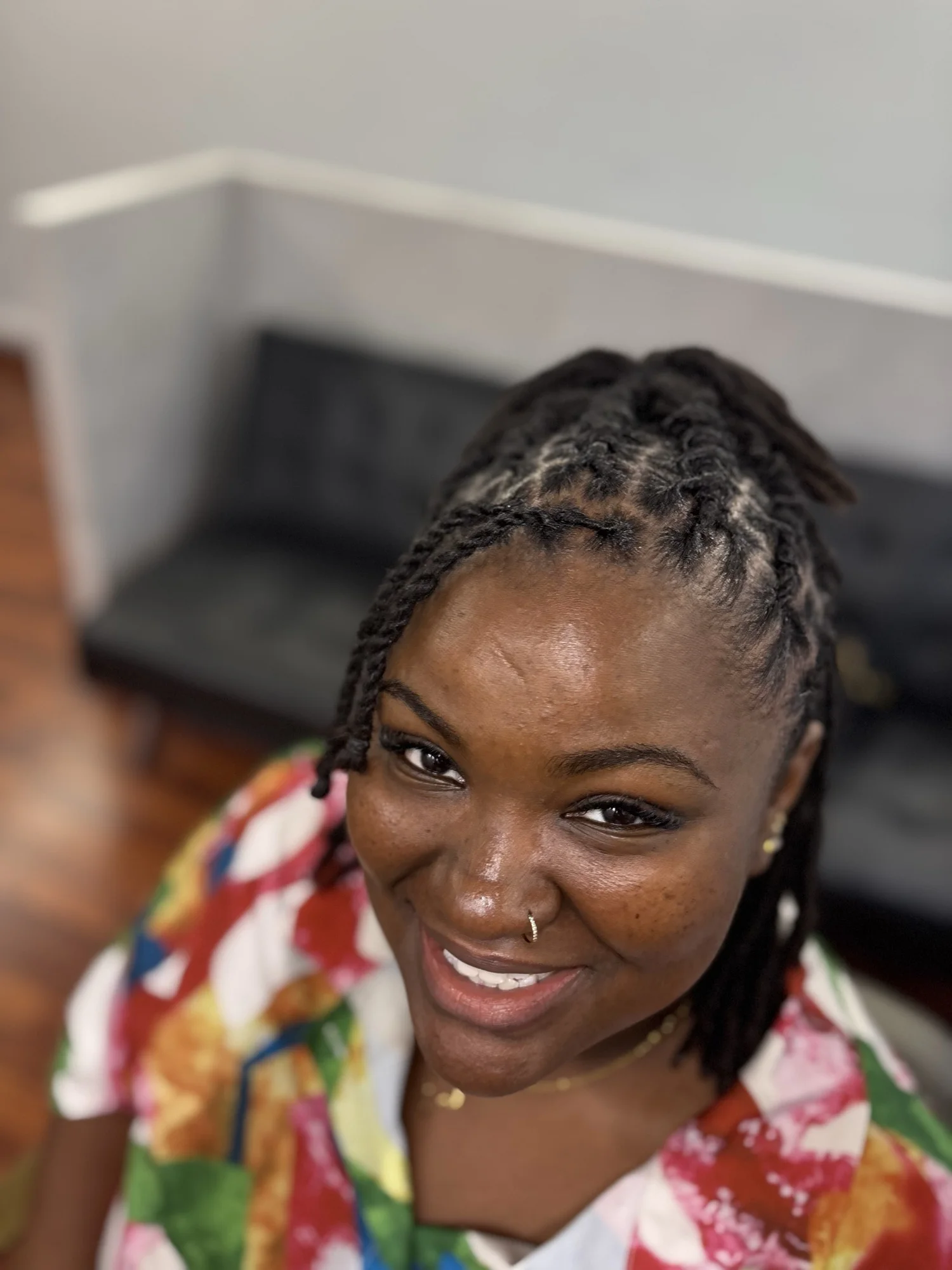 Smiling client with freshly done box braids