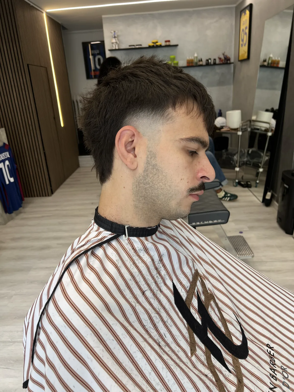 A textured top with a mid fade